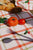 Tablecloth, Green & peach checkered w/ embroidered radish